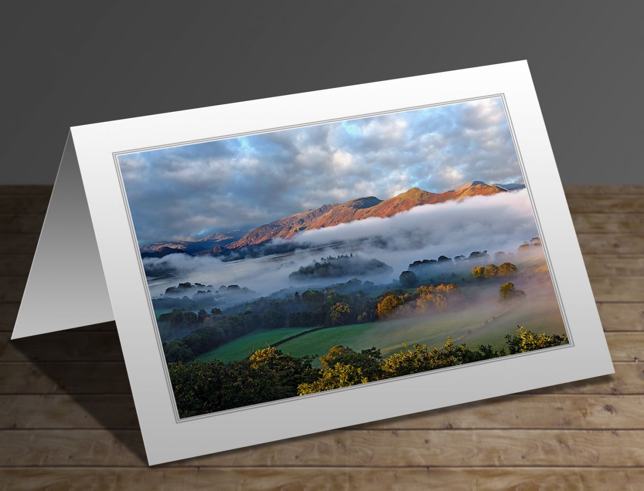 A greetings card containing the image Mists over Derwentwater and Catbells by Martin Lawrnce