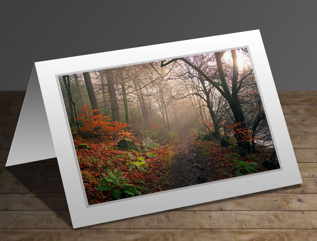 A greetings card containing the image Footpath through Dodd Wood Bassenthwaite by Martin Lawrence