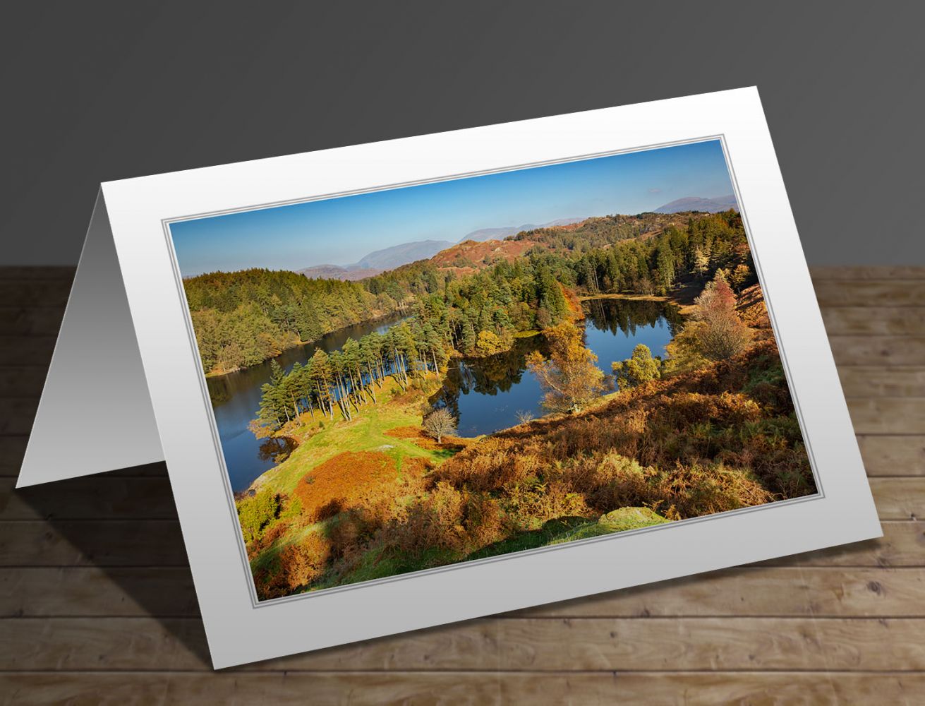 A greetings card containing the image Tarn Hows in autumn sunshine by Martin Lawrence