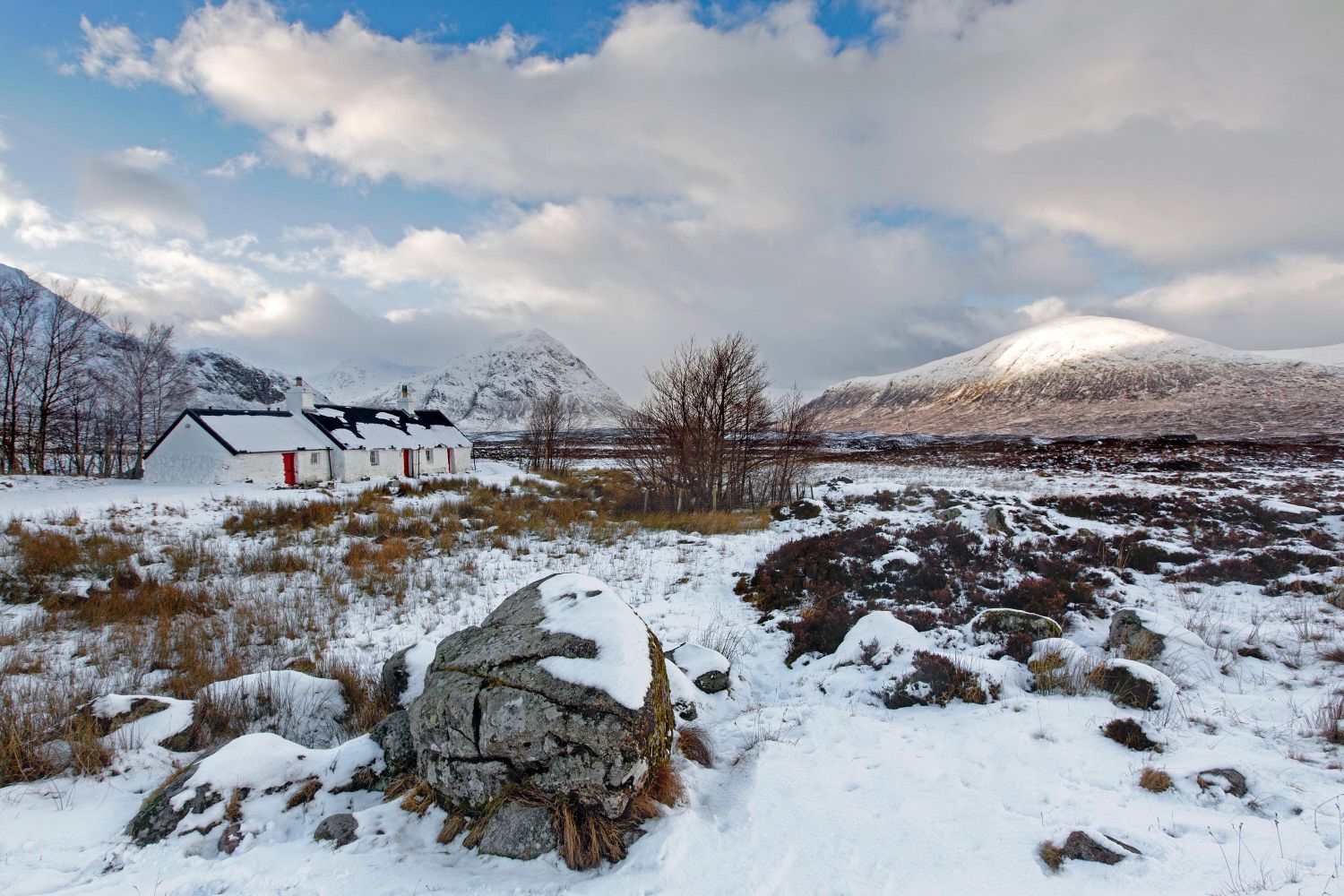 The famous Blackrock Cottage in winter at Glencoe with Buachaille Etive Mor in the background.