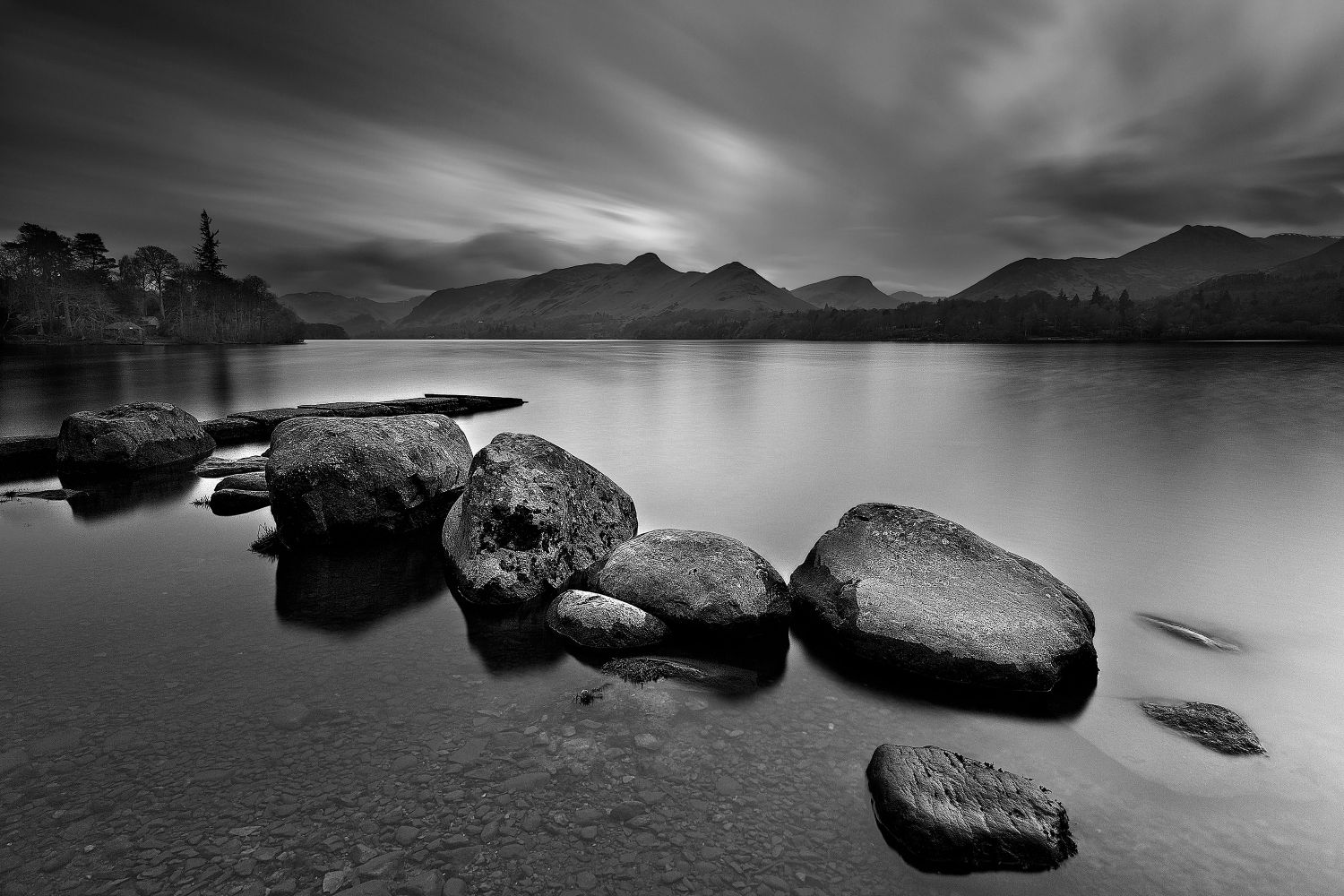 Last Rays of Light over Isthmus Bay Derwentwater in Black and White