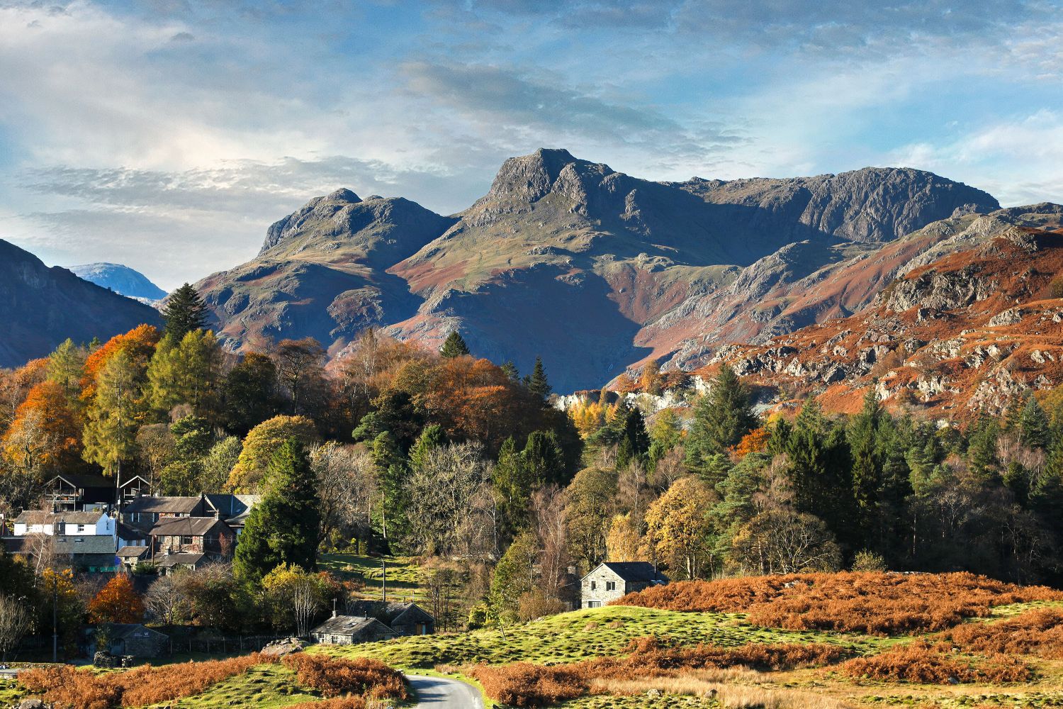 Autumn surrounds The Langdale Pikes by Martin Lawrence