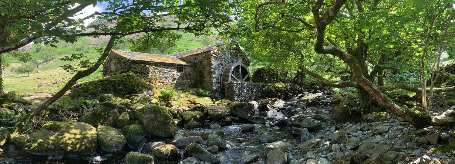 A panoramic view of The Old Borrowdale Mill near Keswick by Martin Lawrence Photography