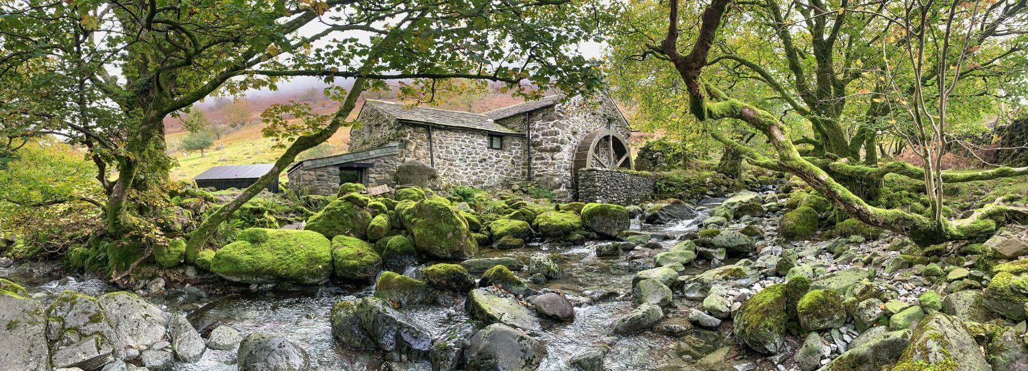 A panoramic view of The Old Borrowdale Mill near Keswick by Martin Lawrence Photography