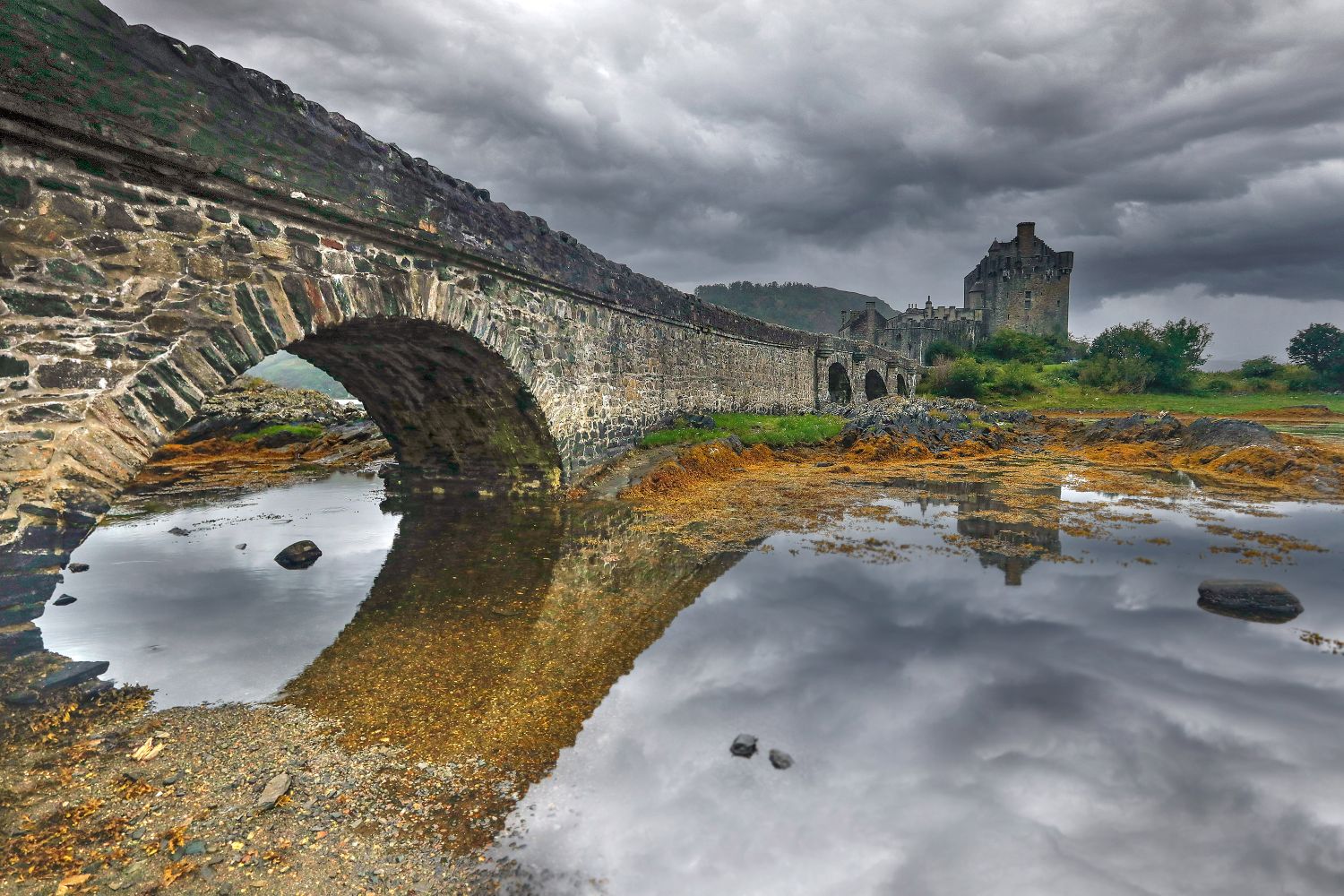 Storm clouds over Eilean Donan Castle by Martin Lawrence Photography Storm clouds over Eilean Donan Castle by Martin Lawrence Photography