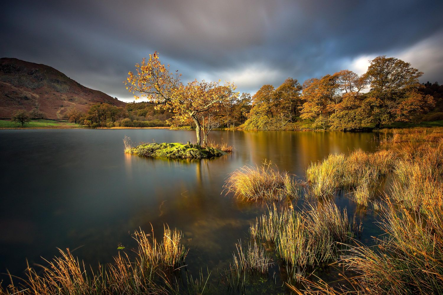 Spectacular autumn light on Rydal Water and Loughrigg Fell