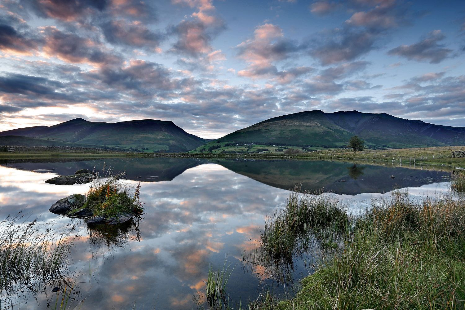 Skiddaw and Blencathra reflections in Tewet Tarn