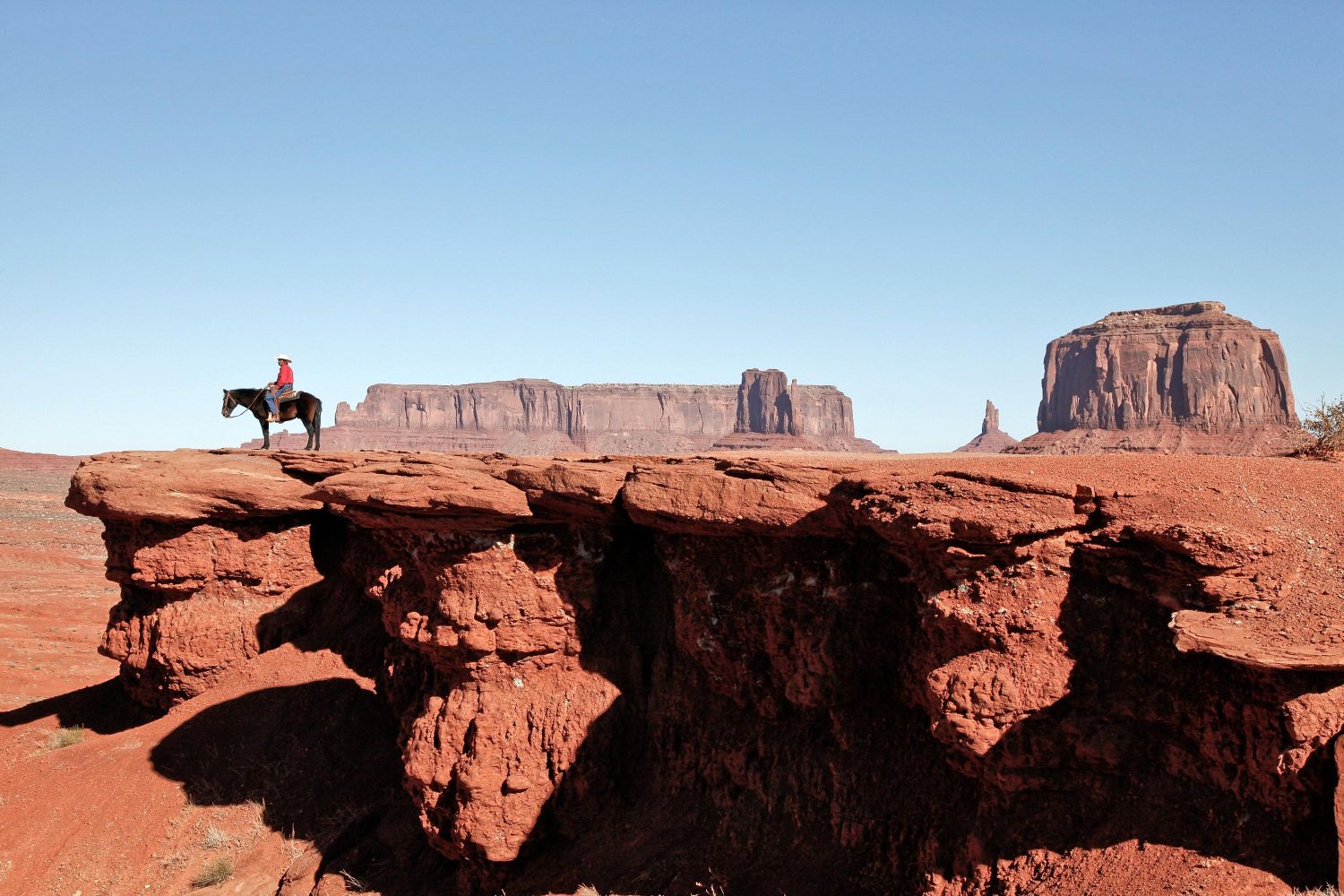 John Ford Point Overlook, Monument Valley - a Navajo Indian on Horseback