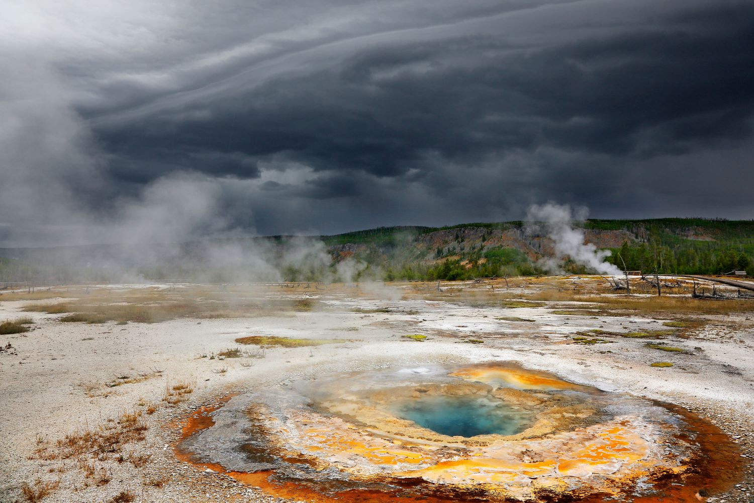 Storm clouds above Mustard Springs at Yellowstone National Park