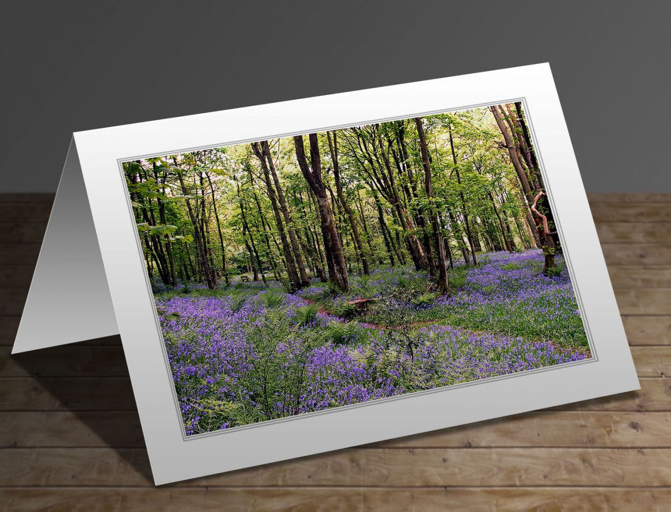 A greeting card featuring the image A carpet of bluebells at Calder Vale, Lancashire by Martin Lawrence