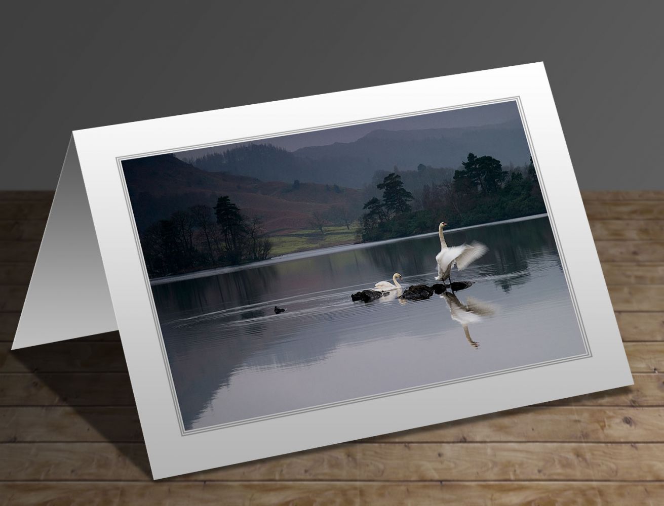 A greeting card featuring the Lake District image Dawn Display at Rydal Water by Martin Lawrence