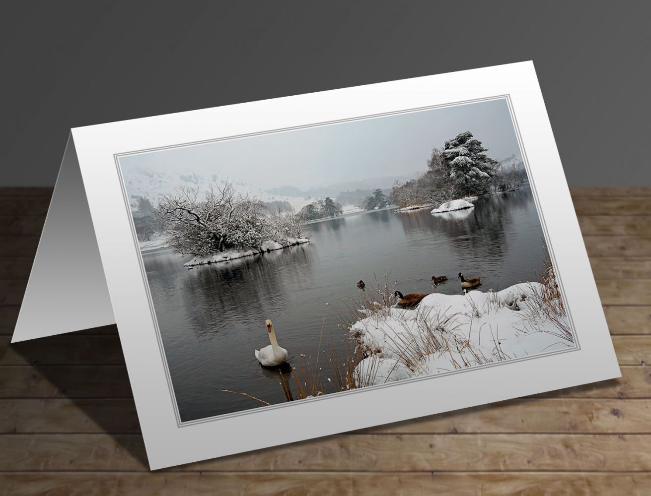 A greeting card containing the image Swan Lake at Rydal Water in the English Lake District by Martin Lawrence