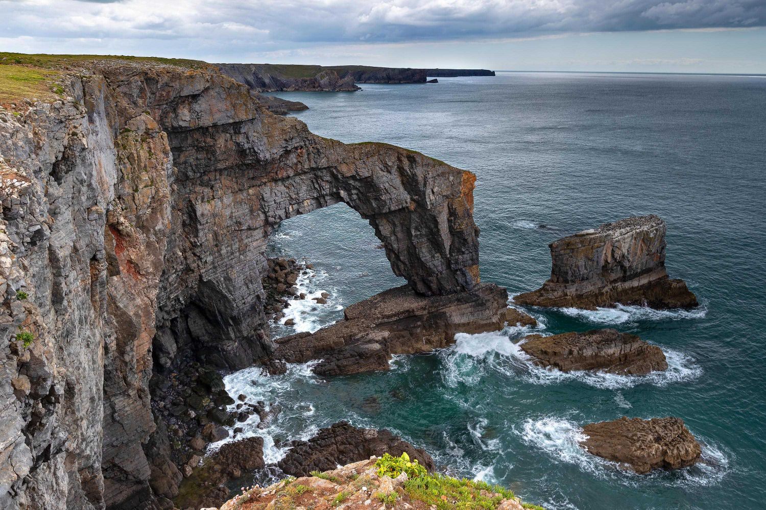 The Green Bridge of Wales which lies alongside the Pembrokeshire Coast Path