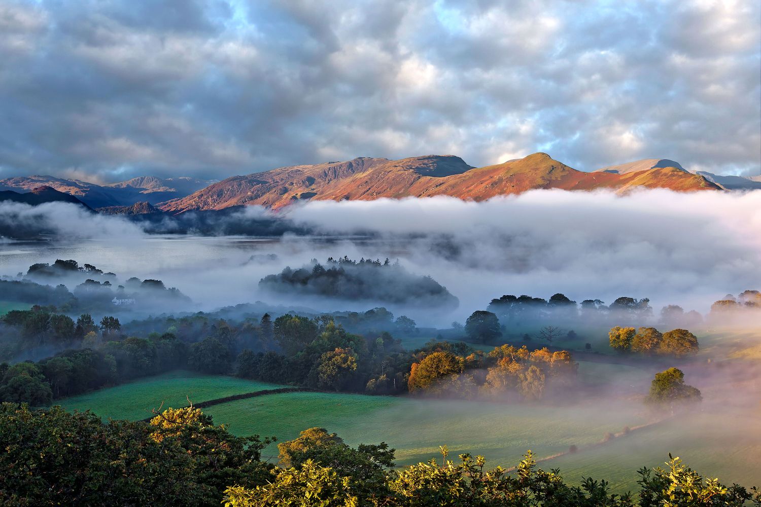 Mists over Derwentwater and Catbells from Castlehead